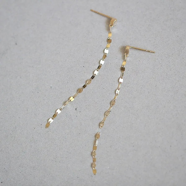 Boucles d’oreilles YOU or jaune et cristaux blancs